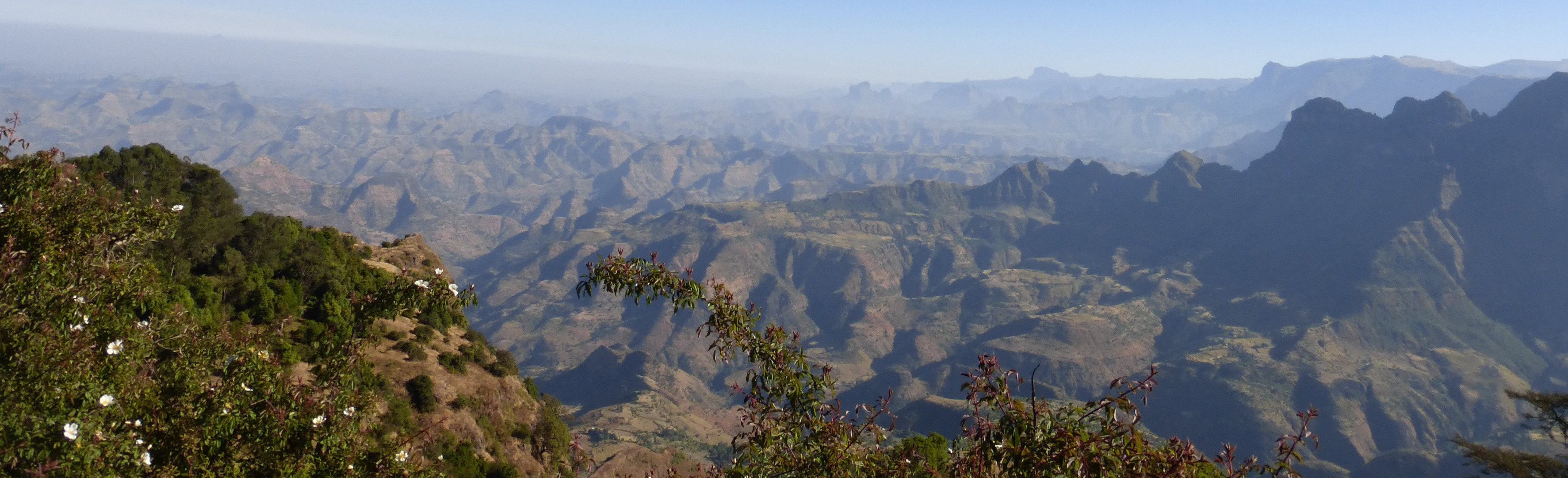 View of craggy valleys which fade into the background